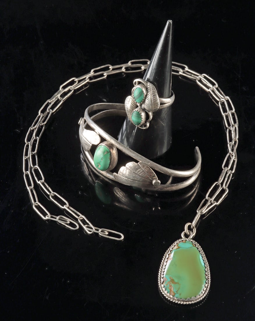 Navajo Silver Malachite Ring, Turquoise Necklace & Cuff: Native American, Southwestern United States, Navajo / Pueblo, ca. mid to late 20th century CE. A group of sterling silver jewelry including a cuff bracelet set with a turquoise cabochon, a ring set wi