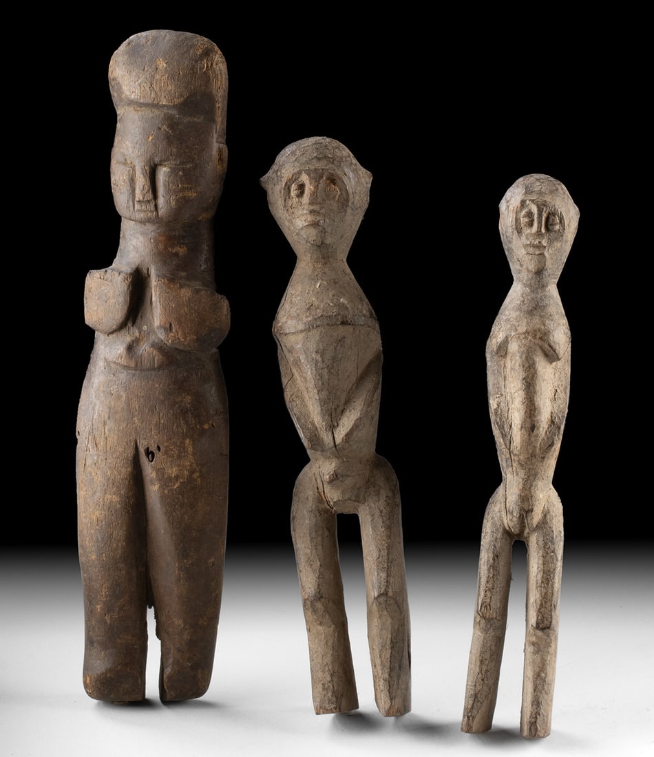 Three Lobi Wood Bateba Shrine Figures - Burkina Faso: West Africa, Burkina Faso, Lobi peoples, ca. early to mid-20th century CE. A compelling group of three carved wooden bateba shrine figures created by Lobi artists of southwestern Burkina Faso. Each sc