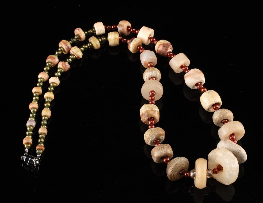 Ancient Quartzite & Agate Bead Wearable Necklace: Central Asian / Mesopotamian, Egyptian, Roman, and Islamic cultures, ca. 1200 BCE to 1300 CE. A wearable necklace assembled in modern times from an assorted group of ancient stone beads, paired with m