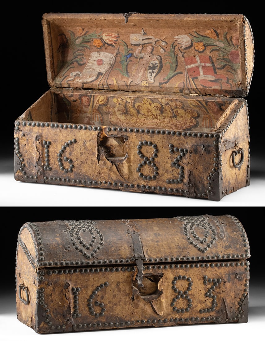 Rare 17th C. European Hide & Painted Heraldic Chest: Western Europe, ca. 17th century CE. An exceptional late 17th-century armorial/ceremonial chest, wooden body covered in hide and mounted with wrought-iron strap hinges, side ring handles, and corner
