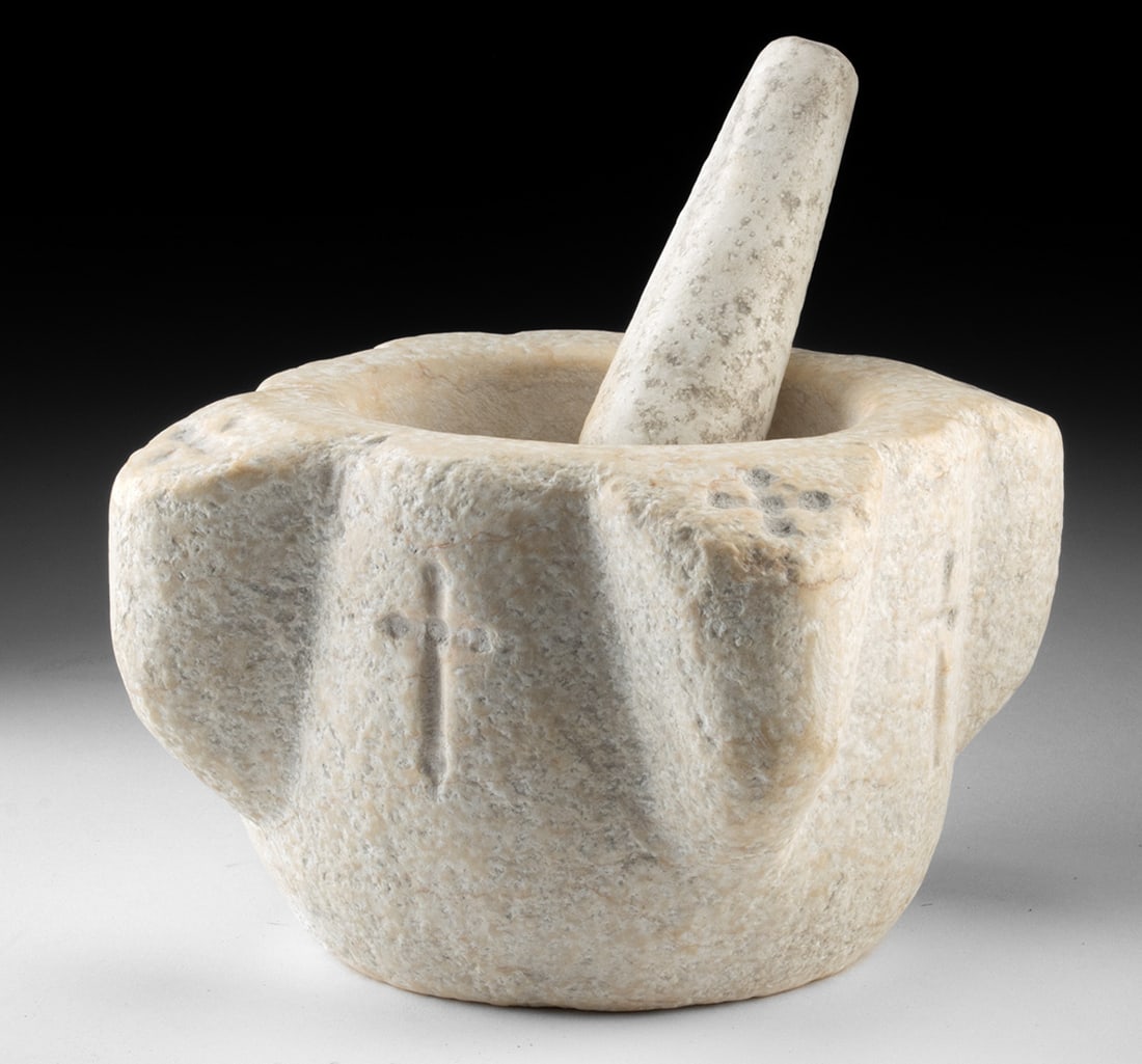 17th C. Spanish Marble Mortar and Pestle with Crosses: Western Europe, Spain, ca. 17th century CE. A fine Spanish marble mortar and pestle, hand-carved from a single block of creamy white stone with a soft, timeworn surface. The mortar features a