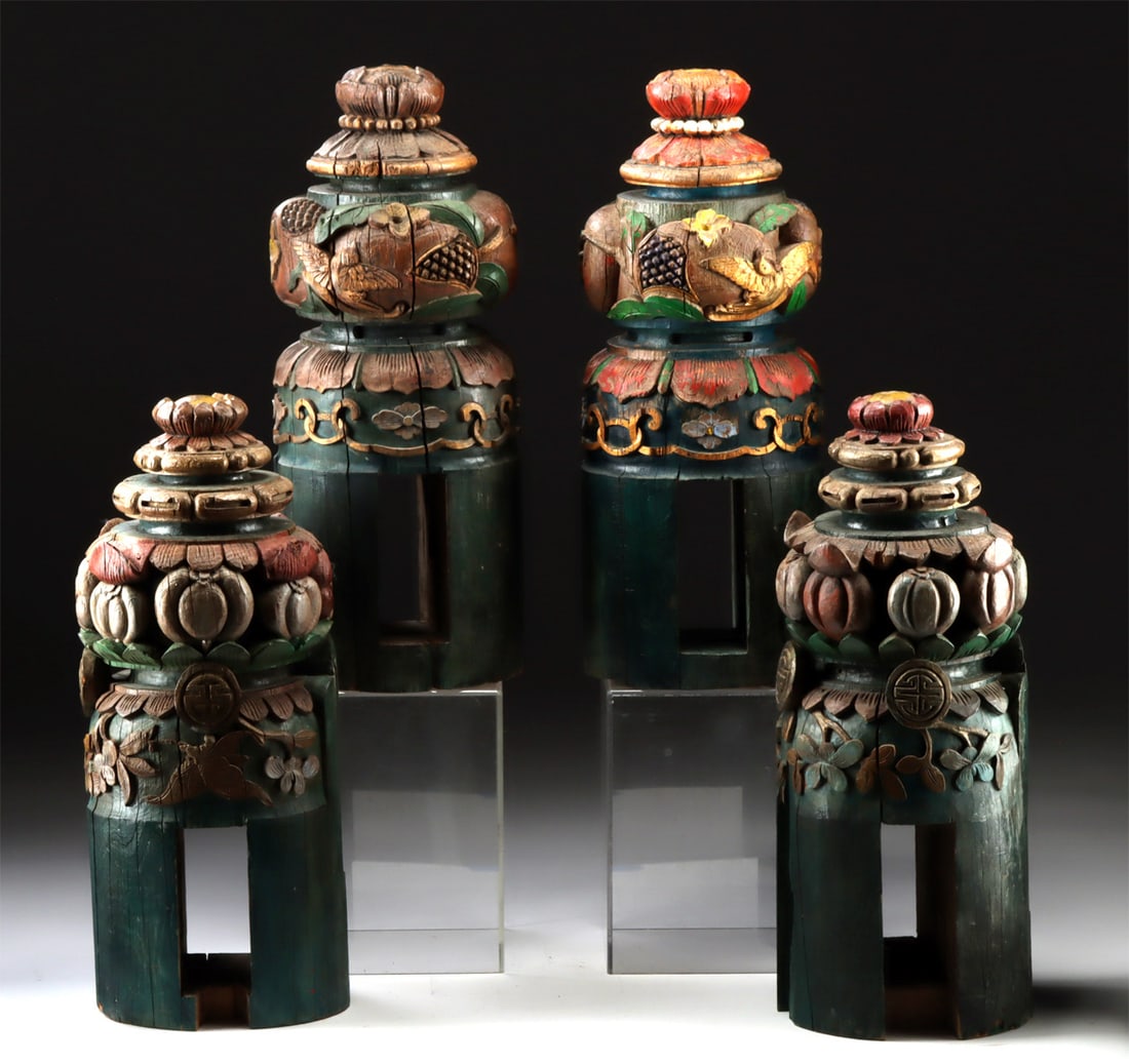 4 Chinese Polychrome Wooden Architectural Posts: East Asia, China, Qing Dynasty, ca. 19th to early 20th century CE. A set of four carved wooden architectural posts, each surmounted by a lotus-form finial and decorated with relief-carved floral, ausp
