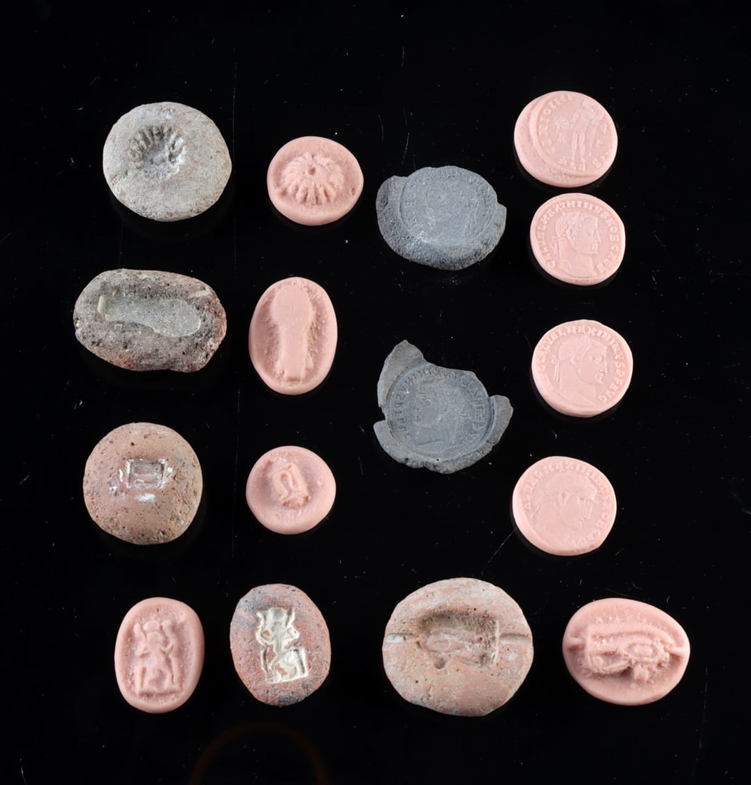 7 Egyptian & Roman Pottery Molds w/ Impressions: Egypt, New Kingdom to Roman period, ca. 1550 to 3rd century CE; Roman, Imperial period, ca. 1st to 3rd century CE. A fascinating group of sixteen objects consisting of seven ancient pottery molds and