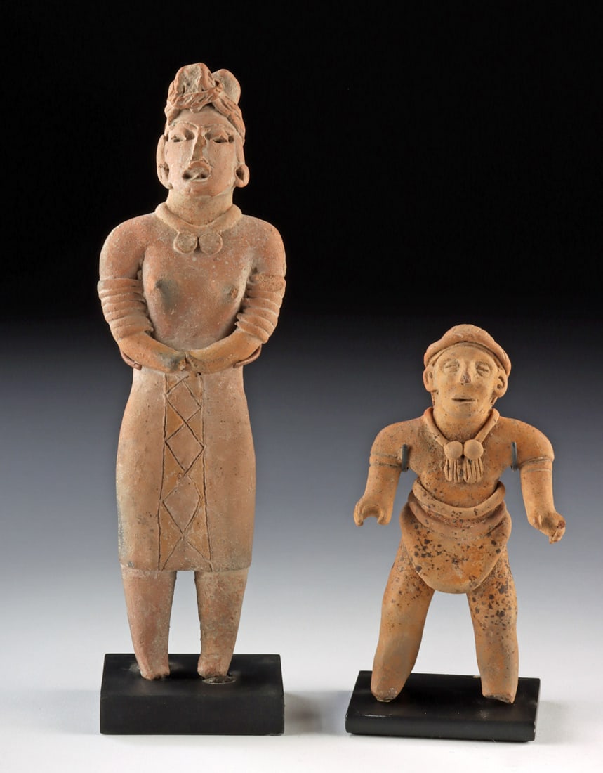 Olmecoid Pottery Female & Colima Male Figural Whistle: Pre-Columbian, Mesoamerica, Gulf Coast Olmecoid tradition, ca. 900 to 400 BCE; West Mexico, Colima culture, ca. 300 BCE to 300 CE. A fascinating pair of Pre-Columbian Mexican pottery figures represent