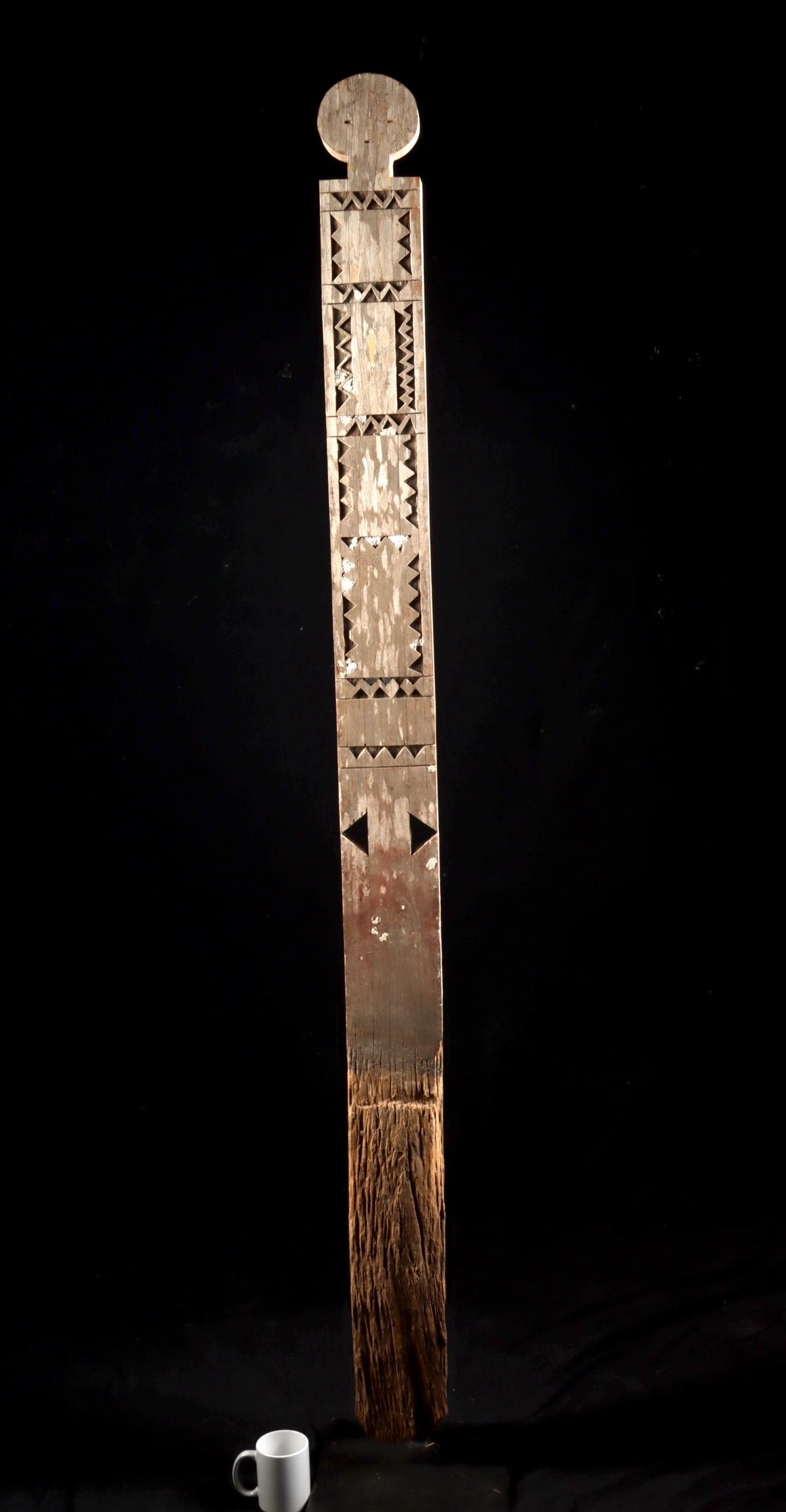 Large Giriyama Wood Memorial Funerary Post - Kigango: East Africa, Kenya, Nyika peoples, Giryama (also Giriyama, Giriama) group, ca. mid-20th century CE. A tall and powerfully abstract carved wooden kigango, a memorial post created by the Mijikenda