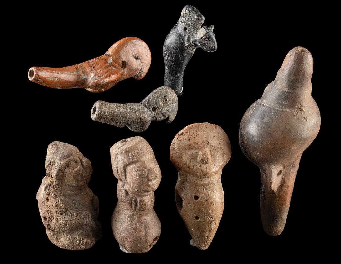 Seven Mesoamerican & Andean Pottery Miniatures: Pre-Columbian, Mesoamerica and the Andes, various cultures, ca. 200 BCE to 1500 CE. A group of seven Pre-Columbian pottery miniatures including four whistles, one figural pipe, and two small suspensio