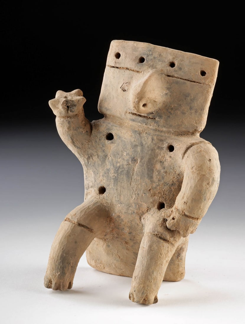 Quimbaya Terracotta Seated Figure w/ Raised Arm: Pre-Columbian, Colombia, Quimbaya culture, ca. 700 to 1600 CE. A distinctive Quimbaya pottery figure constructed from square and rectangular slabs of clay forming the head and torso, with heavy coils