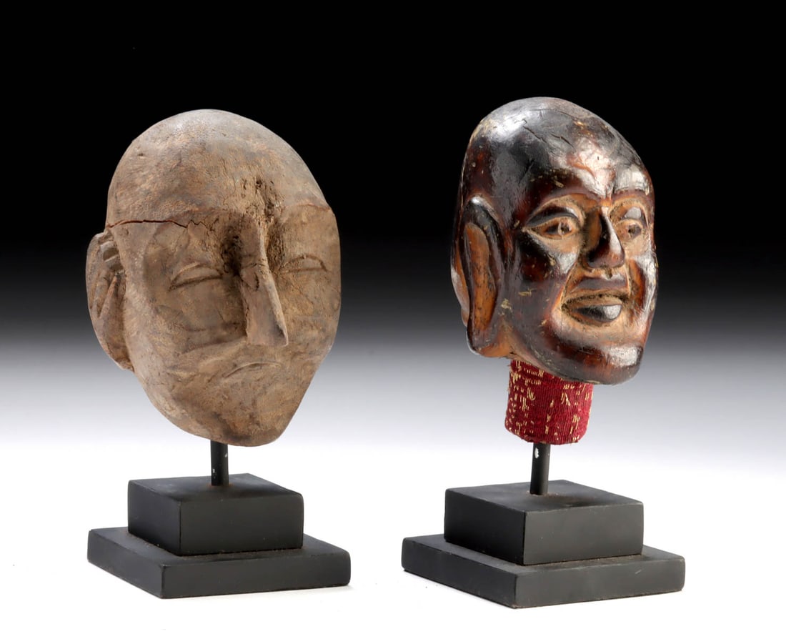 Two Southeast Asian Wooden Puppet Heads: Southeast Asia, possibly Indonesia (Java) or Myanmar (Burma), ca. late 19th to mid-20th century CE. A rare and expressive pair of carved wooden heads, once animated by voice and gesture, now preserved
