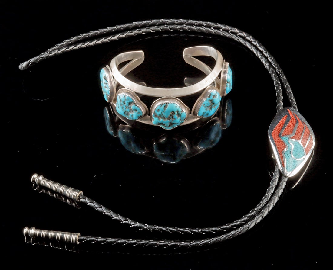 Pueblo Silver Turquoise Cuff by Clarence Chama & Bolo: Native American, Southwestern United States, Pueblo, ca. late 20th to 21st century CE. A sterling silver cuff bracelet by Kewa Pueblo artist Clarence Chama, stamped "C. Chama / Sterling" on the verso