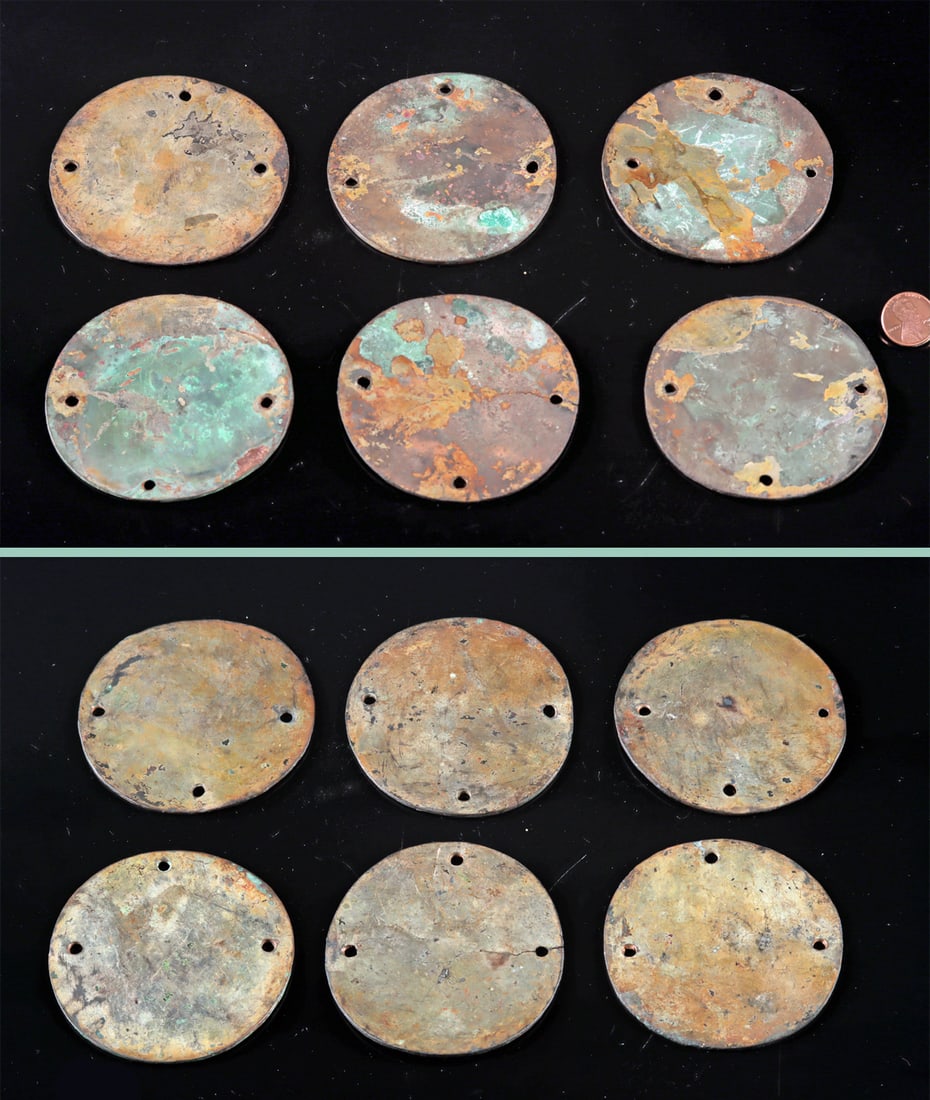 Six Large Chimu Gilt Copper Discs, Regalia Ornaments: Pre-Columbian, North Coast Peru, Chimu culture, ca. 800 to 1450 CE. A set of six large, hammered copper-alloy discs, each formed from thin sheet metal and originally polished to a bright, reflective s