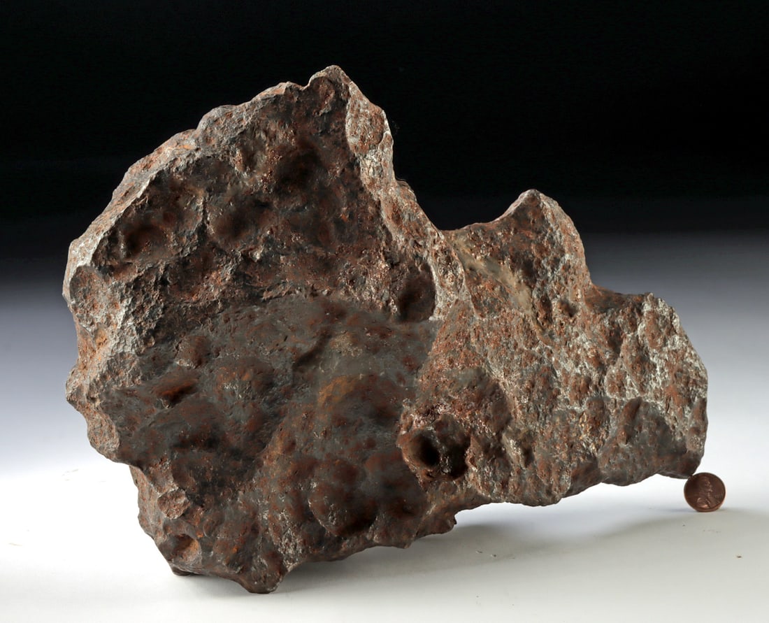 Iron-Nickel Meteorite 40.2 lb with Regmaglypts: Unknown Findsite, ca. millions of years ago. A substantial 40.2 lb (18.1 kg) iron meteorite composed primarily of iron with natural nickel content, displaying a rugged surface marked by pronounced reg