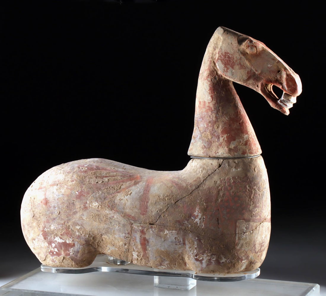 Large Chinese Han Dynasty Pottery Horse Body & Head: East Asia, China, Han Dynasty, ca. 206 BCE to 220 CE. A large pottery horse composed of a hollow-molded body and separately modeled head, both originally part of a full tomb sculpture ensemble. The po