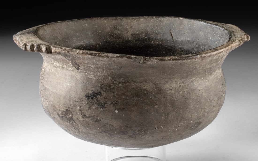 Mississippian Pottery Bowl - Lug Handles: Native American, Mississippian culture, ca. 800 to 1600 CE. A well-balanced pottery bowl with a rounded base and gently flaring rim, accented by opposing ridged lug handles and a softly burnished surf
