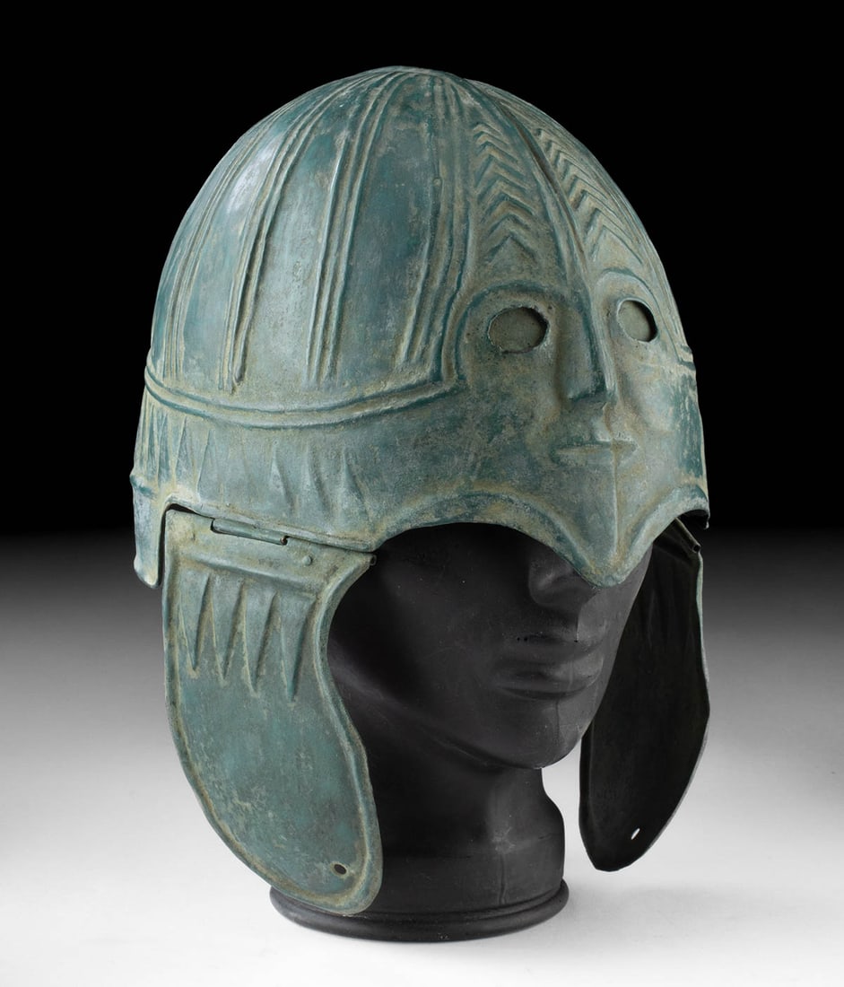 Ancient Greek Copper Helmet - Chalcidian Type: Greece, Classical Period, ca. 5th to 4th century BCE. A commanding example of the Chalcidian helmet type, this copper form balances protection with visibility, reflecting a pivotal evolution in ancien