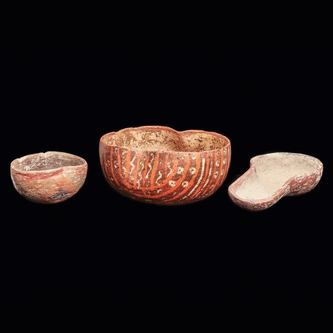 Pre-Classic Pinch Bowls & Olmec Scoop (3): Olmec regions. Ca. 600 BCE - 100 BCE. Three different pottery examples, including the largest pottery pinch bowl, having a red-brown ground with painted orange stripes and white zigzags and circular e