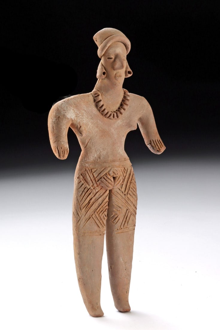 Tall Colima Standing Female Flat Figure (Tomb Offering): Pre-Columbian, West Mexico, Colima, ca. 300 BCE to 300 CE. A hand-built pottery female figure of a characteristically flat form. The nude woman stands atop delineated legs and holds both arms out at h