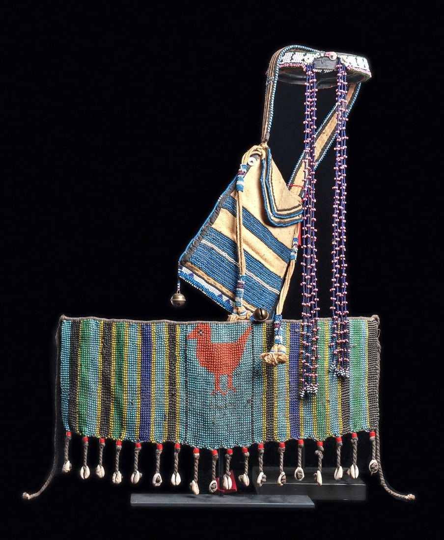Beadwork Group (3): South Africa and Cameroon. Delicate Ndebele crown with colorful tiny beads and mother of pearl buttons. An Ndebele tobacco fabric bag with small beaded detail, shell button, and copper bells. Lastly a