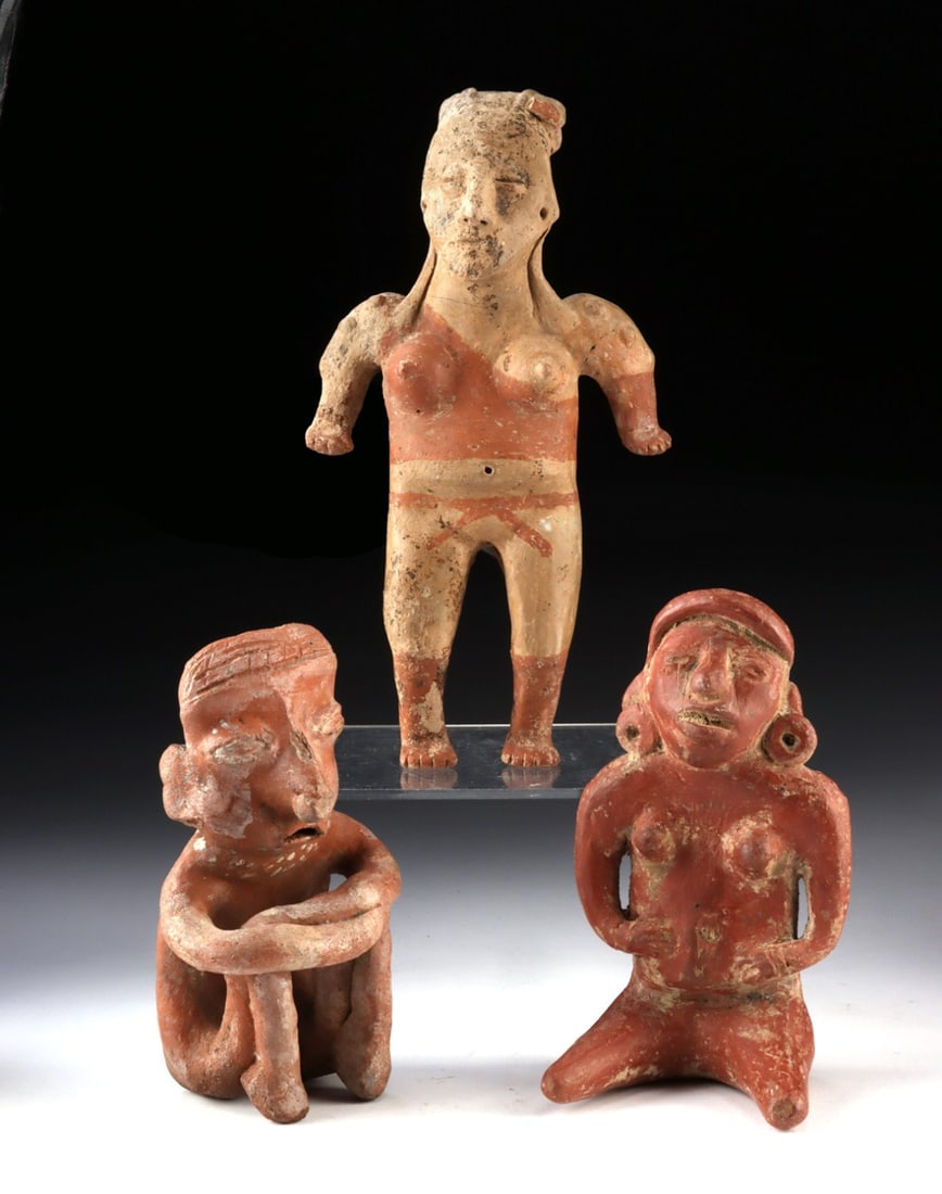 Three Nayarit & Jalisco Polychrome Figures: Pre-Columbian, Western Mexico, Nayarit culture, ca. 100 BCE to 250 CE; Jalisco culture, ca. 100 BCE to 300 CE; Mesoamerica, Maya culture, ca. 250 to 900 CE. A trio of hand-modeled ceramic figures span