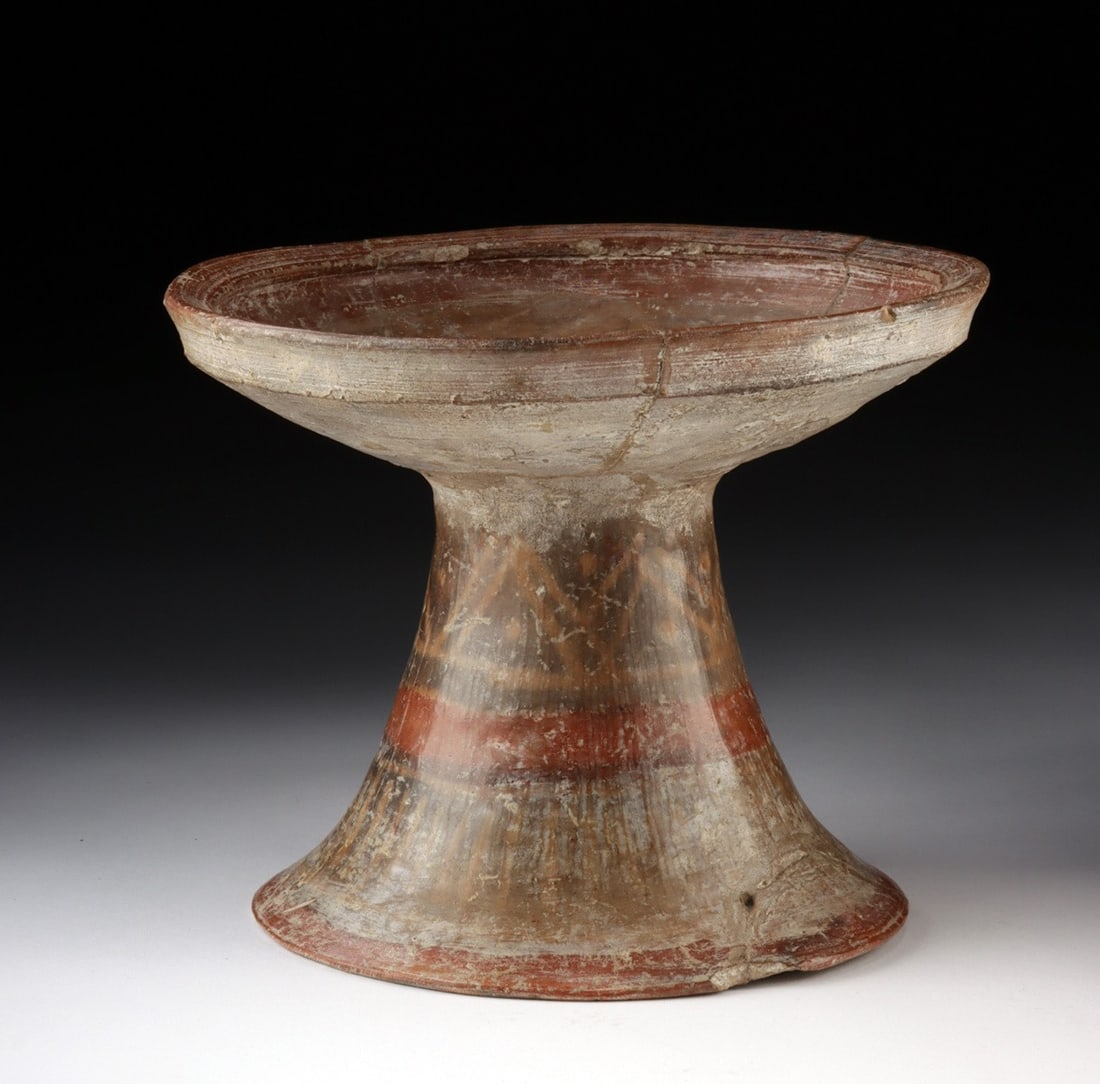 Narino Carchi Ceramic Pedestal Bowl, Resist Paint: Pre-Columbian, Colombia/Ecuador, Narino-Carchi culture, ca. 500 to 1500 CE. A fine Narino-Carchi pedestal dish of elegant hourglass profile, its broad shallow bowl rising from a tall trumpet-flared fo