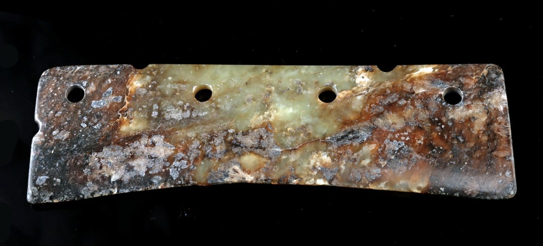 Chinese Neolithic Revival Jade Ceremonial Blade: East Asia, China, late Qing to Republic period, ca. early to mid-20th century CE. A blade carved from nephrite jade, inspired by Neolithic yue axes and early Shang-Zhou blade forms, reinterpreted as a