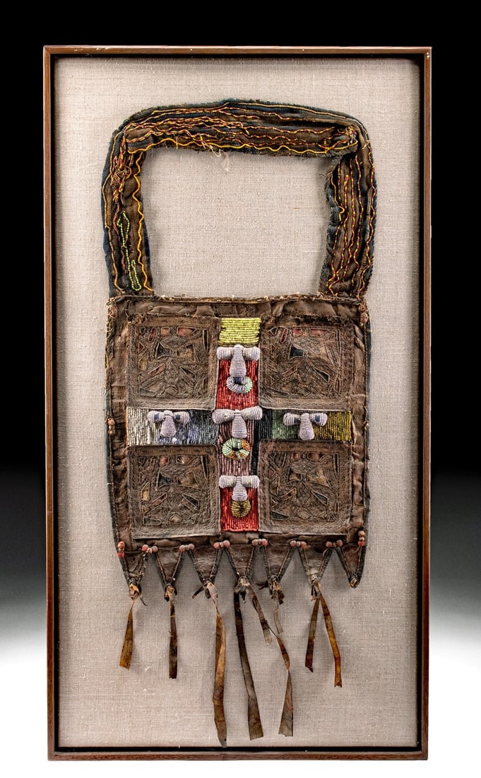 Rare Nigerian Yoruba Babalawo Beaded Divination Bag, Ca. 1900: West Africa, Nigeria, Yoruba culture, ca. 19th to early 20th century CE. A beautiful and large leather and burlap bag decorated with hundreds of glass seed beads. The bag was intended for a priest or 