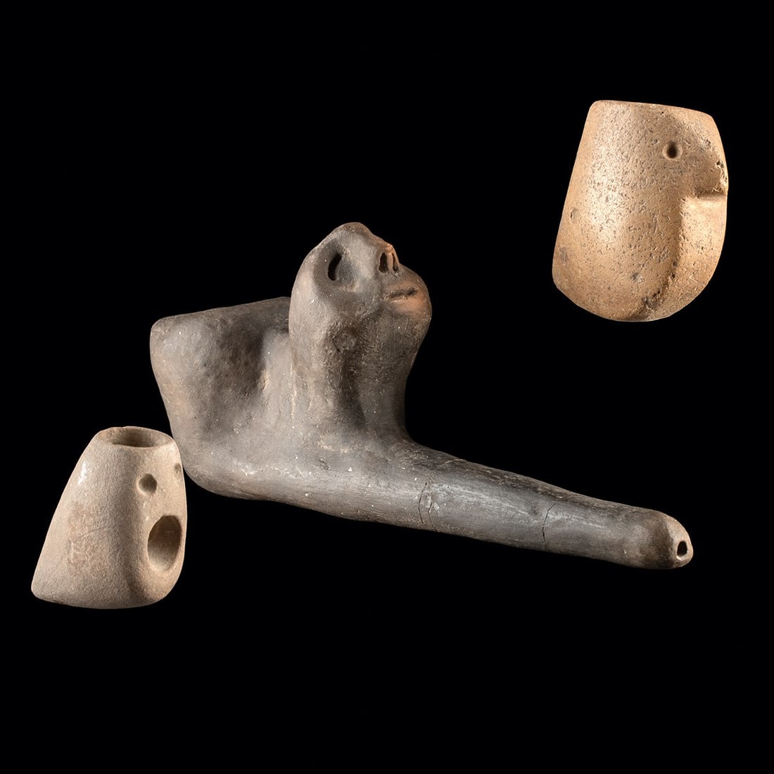 Three Native American Woodland Effigy Face Pipes (1 of 3)