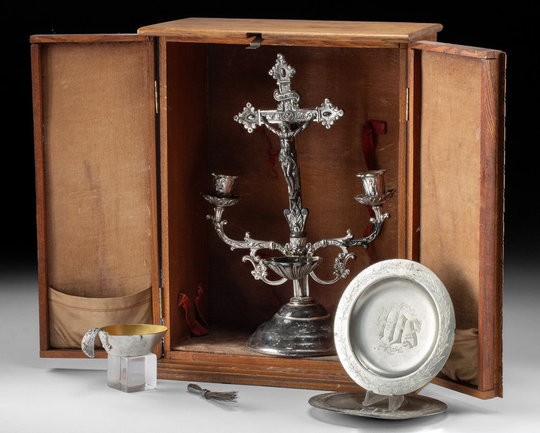 19th Century Last Rites Set Used in the Southwest: A compact oak cabinet opens like a small altar, revealing the solemn instruments of last rites carefully arranged within. This Homan sick-call set, manufactured circa 1897 by the Homan Silver Plate Co