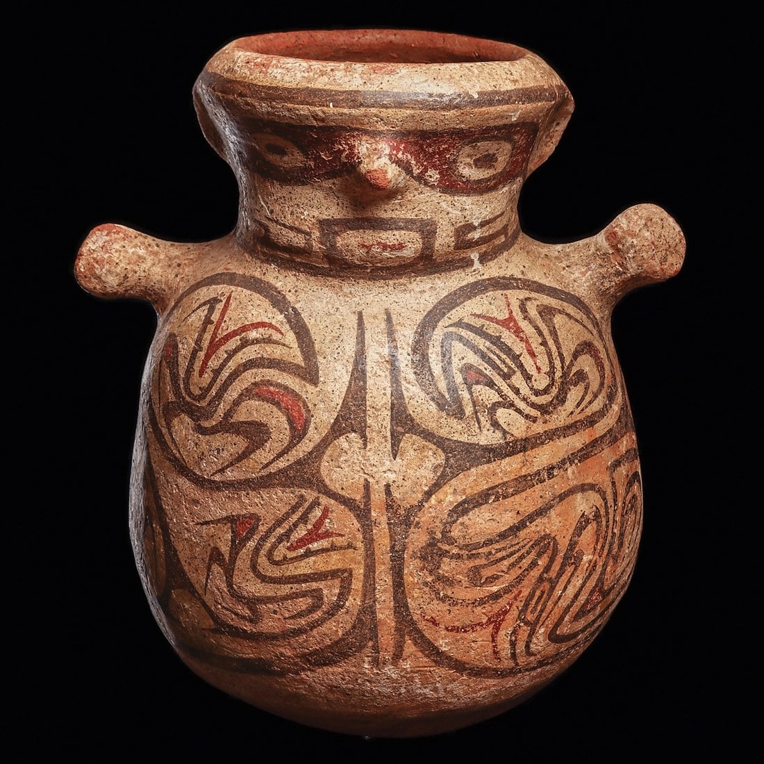 Cocle Anthropomorphic Vessel: Panama, ca. 900 - 1100 CE. Large polychrome decorated pottery anthropomorphic vessel, depicting a stylized human figure with short outstretched arms, relief nose and ears, and a wide opening in the to