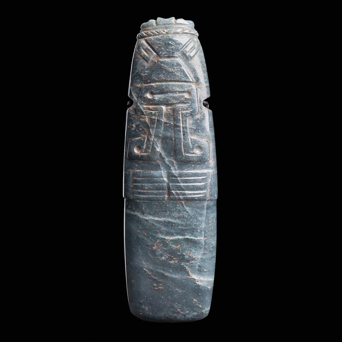 Costa Rican Large Jade Anthropomorphic Celt Pendant: Costa Rica, ca. 500 - 1000 CE. Carved large blue-green jade anthropomorphic deity celt pendant. Holding both hands across his stomach, delineated fingers. Tapered head with string cut, carved and dril