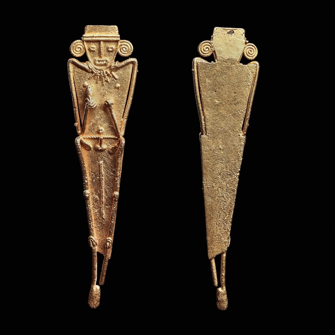 Muisca Gold Standing Tunjo Figure: Andes Mountains, Colombia, ca. 1000 - 1550 CE. Fine high quality cast gold standing male votive figure of angular form, having long tapered legs, wide angular shoulders, wearing a head band, spiral ea