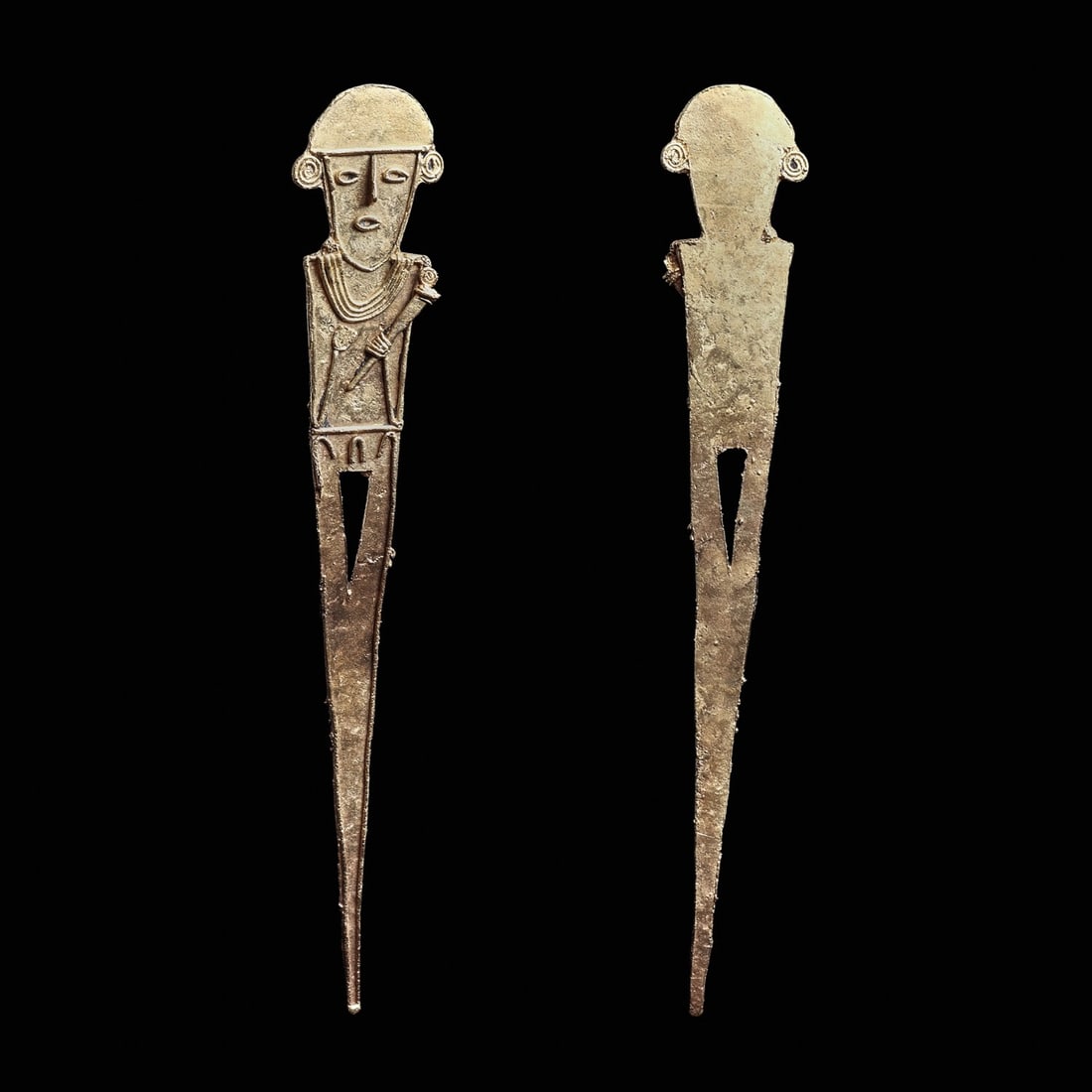 Muisca Gold Standing Tunjo Figure: Andes Mountains, Colombia, ca. 1000 - 1550 CE. Fine cast gold standing votive figure of angular form, having very long tapered legs, wearing a dome headdress, spiral earrings, multi-strand necklace, h