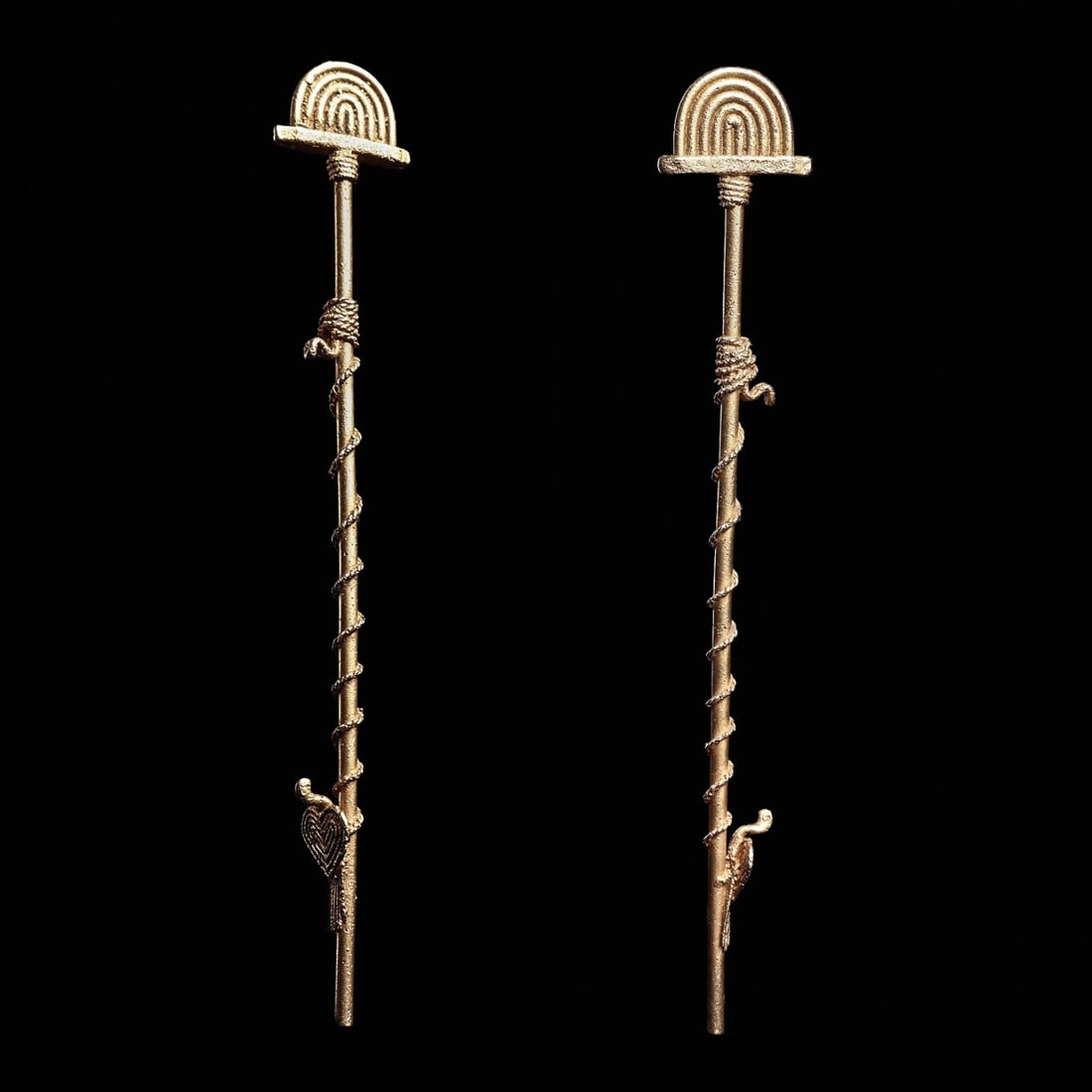 Muisca Gold Atl Atl: Andes Mountains, Colombia, ca. 1000 - 1550 CE. Fine gold votive atl-atl having a cast gold multi-arched finial attached to a lower gold shaft. The shaft of the atl-atl is wrapped with a fine cast brai