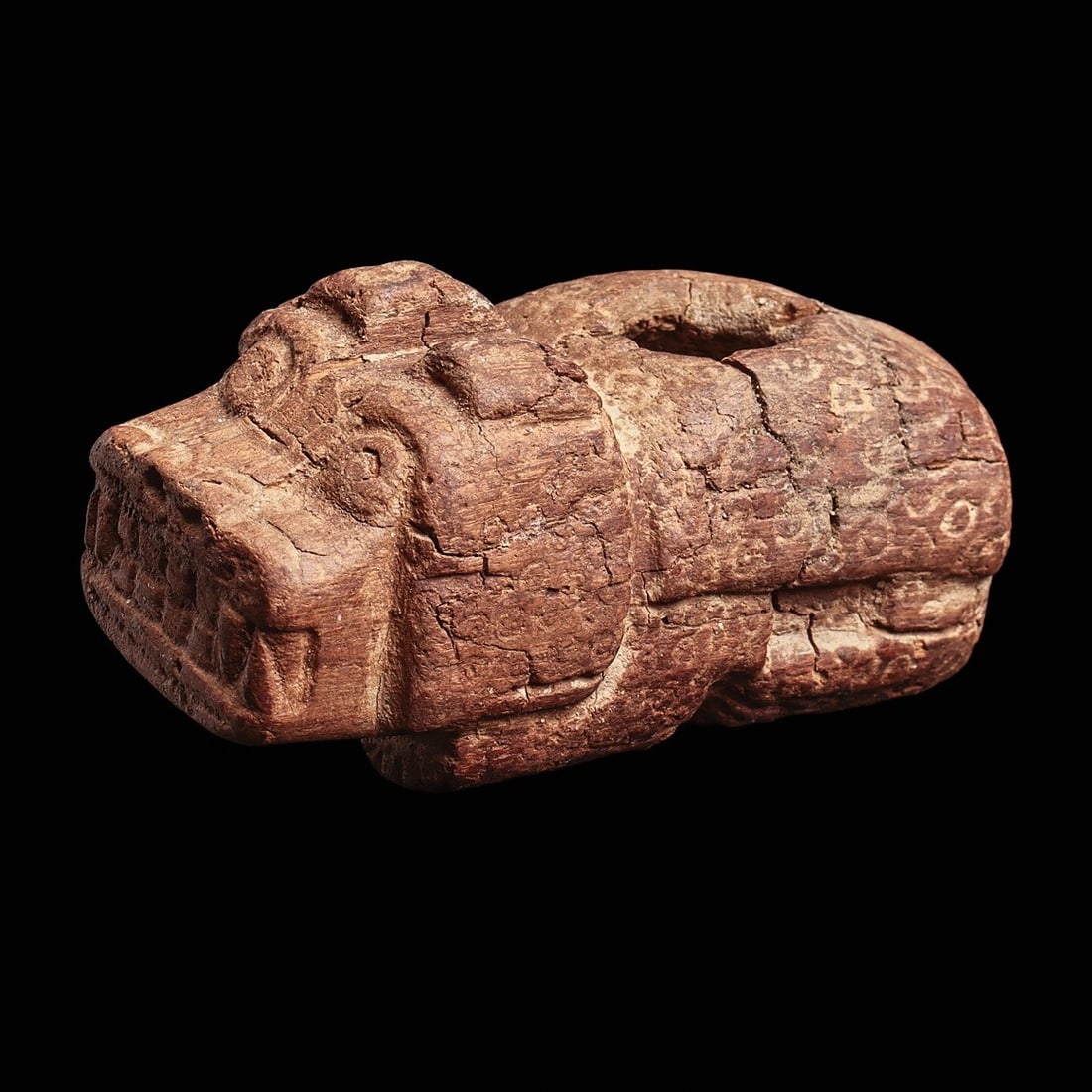 Chavin Wooden Poporo: North coast, ca. 1200 - 500 BCE. On list at $1,800. Previously consigned for $1,500. Carved wood poporo in the form of a crouching jaguar, having a carved opening in the center of his hollow body. Wel