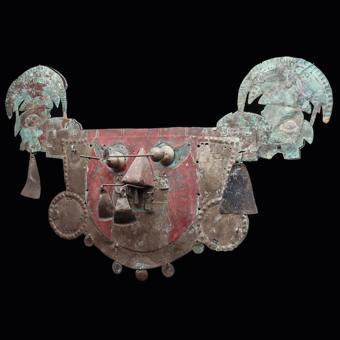 Important Sican Silver/Copper Mask with Danglers: Lambayeque Valley, North coast, ca. 800 - 1200 CE. A large royal silvered sheet copper mummy mask having large drop shaped eyes with applied button pupils and silver bead eyes with extended sliver dan