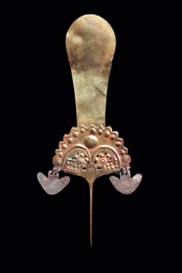 Huari Royal Gold Plume: Huari, ca. 700 - 1000 CE. Royal sheet gold plume decorated with a relief and openwork decoration, depicting two semiabstract mythological zoomorphs or birds, each having a triple ball raised head cres