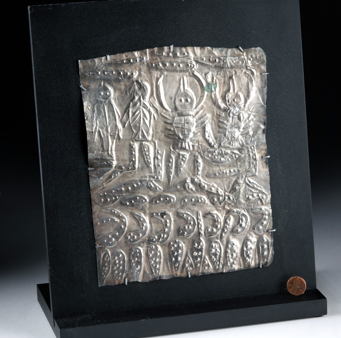 Sican-Lambayeque Silver Votive Plaque, Repousse Marine Figures: Pre-Columbian, North Coast Peru, Sican-Lambayeque., ca. 800 - 1000 CE. An extremely rare votive plaque comprised of high-grade silver (96% silver) most likely used to decorate a temple - depicting lob