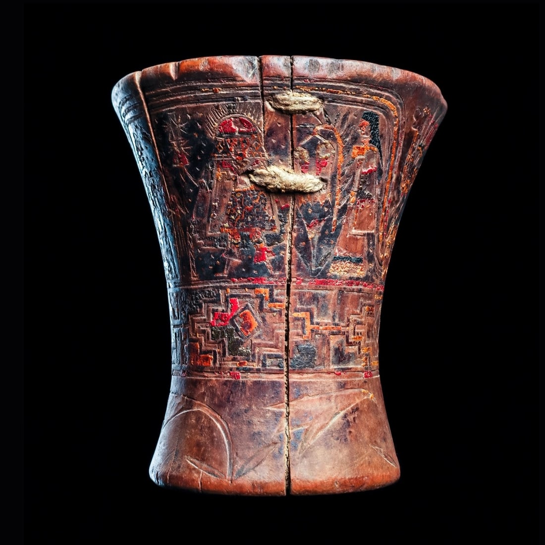 Inca Decorated Wood Kero: Inca Empire, ca. 14th - 15th century CE. Carved wooden kero having an incised carved decoration and painted with a multicolor resin paint. Two large upper registers depicting royal Inca emperor flanke
