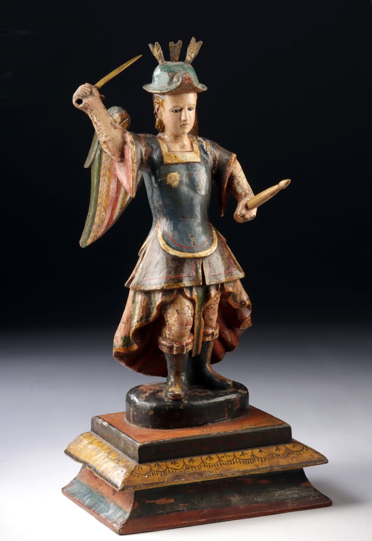 Mexican Colonial San Miguel Arcángel Bulto, Glass Eyes, ex-Holler & Saunders: Spanish Colonial, Mexico., ca. 1700 - 1799 CE. A polychrome and gessoed wood bulto of Saint Michael the Archangel, animated with the kinetic energy that distinguishes the finest colonial Mexican sacre