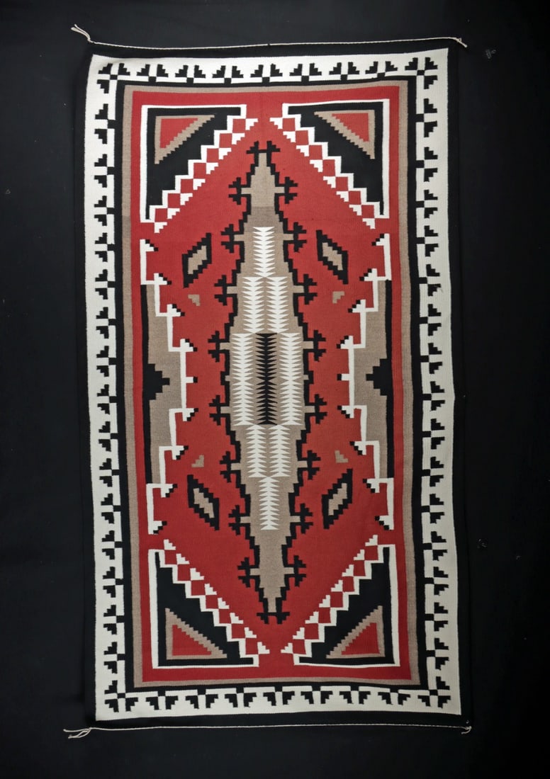 Vintage Navajo Klagetoh Rug - Stepped Medallion: Native American, American Southwest, Navajo (Dine), Klagetoh regional style., ca. 1900 - 1966 CE. A finely woven Navajo Klagetoh rug of commanding presence, worked in natural carded wools of black, cr