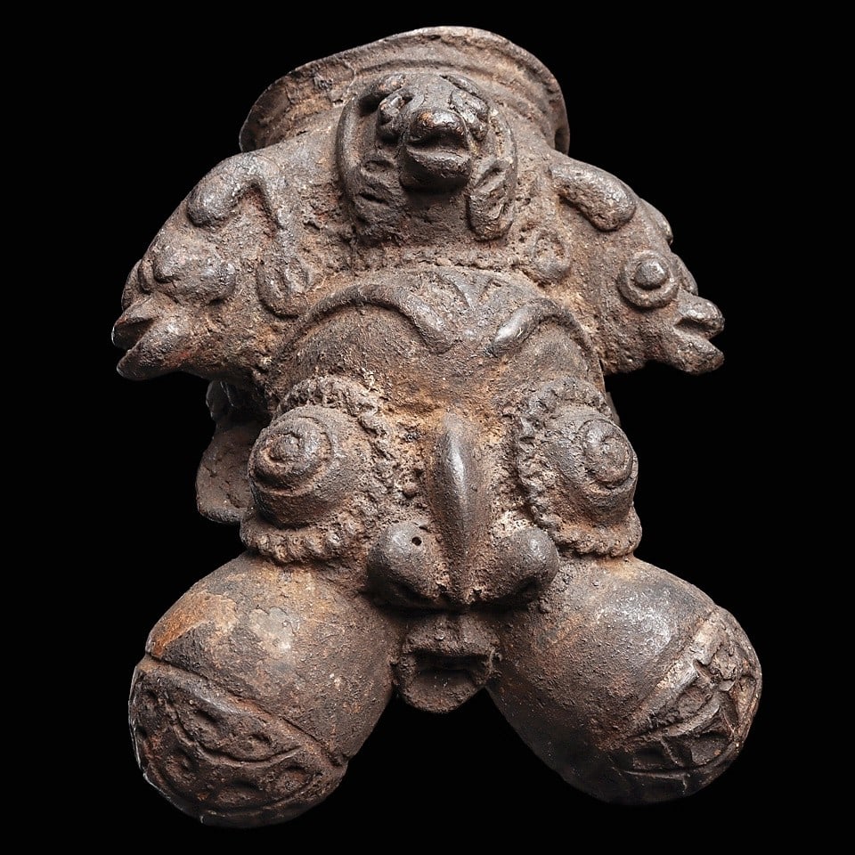 Grassfields Bronze Chief’s Pipe with Animal Heads: Cameroon., . Copper alloy ceremonial pipe bowl in form of a notable and court figure with expressive bulging cheeks with net pattern, small open mouth with teeth beneath, and face with large concentri