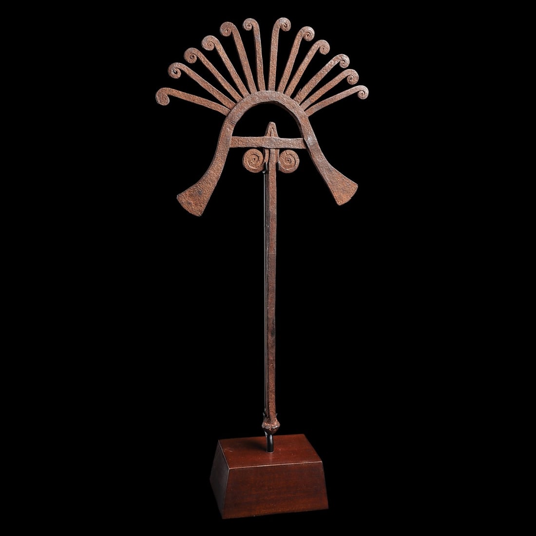 Igbo Currency: Nigeria, . Iron currency in form of a head with concentric eyes and radiating crown. Custom mounted.17.25”H (43.8cm). Provenance: Ex. Albert Stanziano collection (1947-2021), Clifton, NJ. By