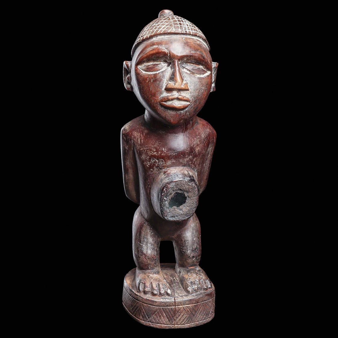 Kongo Nkisi Figure: Democratic Republic of Congo / northern Angola, late 19th - early 20th century. Carved of hardwood, white pigment.10.75”H (27.3cm). Provenance: Previously owned by The Art Institute of Chicago. 