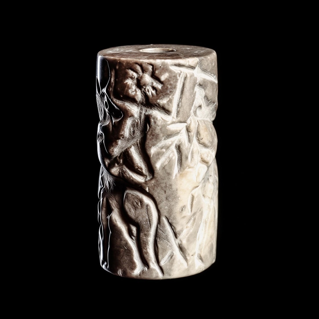 Old Babylonian Large Cylinder Seal: Mesopotamia, ca. 2000 - 1750 BCE. Gray marble cylinder seal having an elaborately carved rollout impression depicting a rearing lion attacking a deer having a large antler rack, and another lion attac