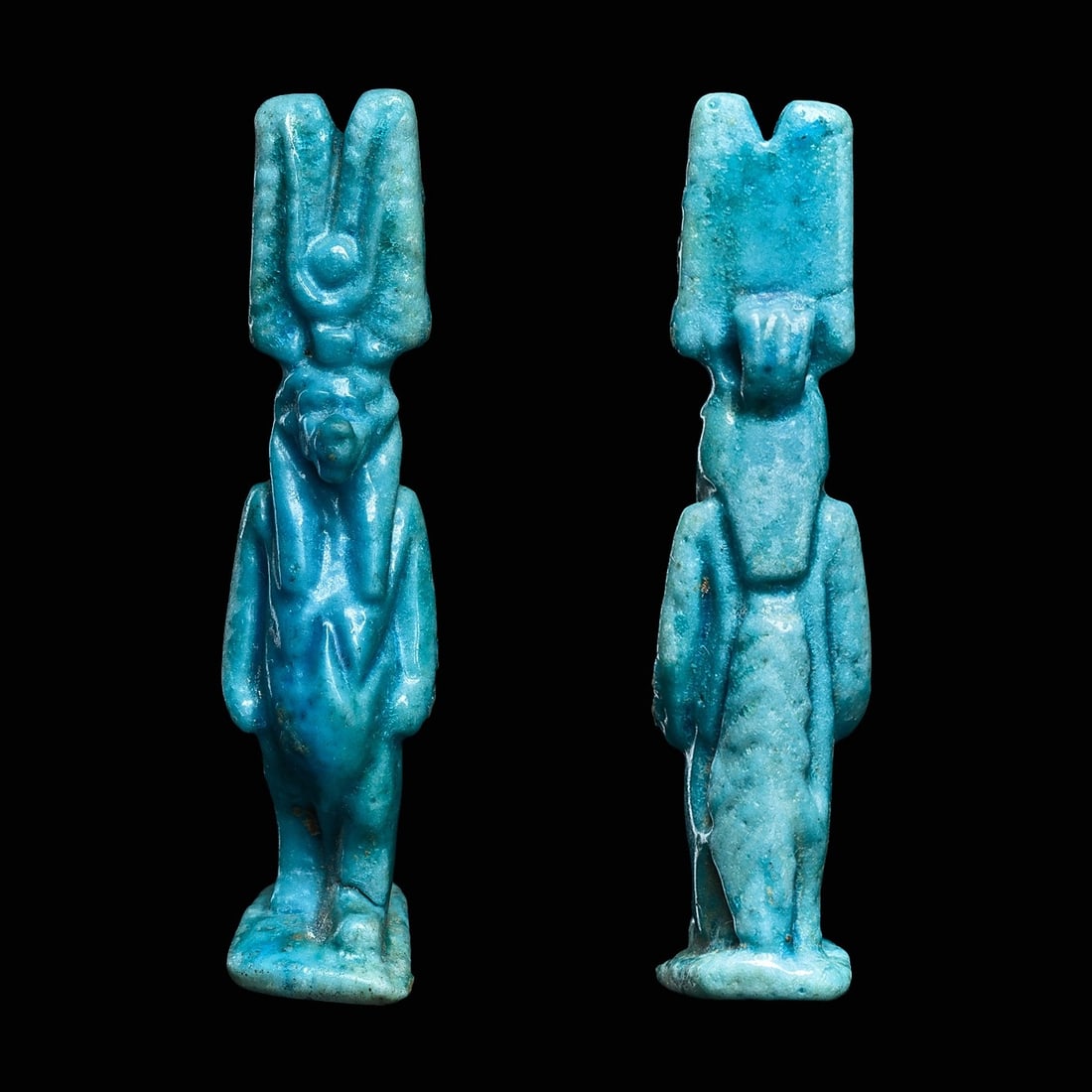 Egyptian Blue Faience Tauret Amulet: Egypt, new Kingdom, ca. 1400 BCE. Fine deep blue glazed faience pottery amulet in the form of the hippo headed goddess of pregnancy and child bearing. She stands striding upon the integral plinth base