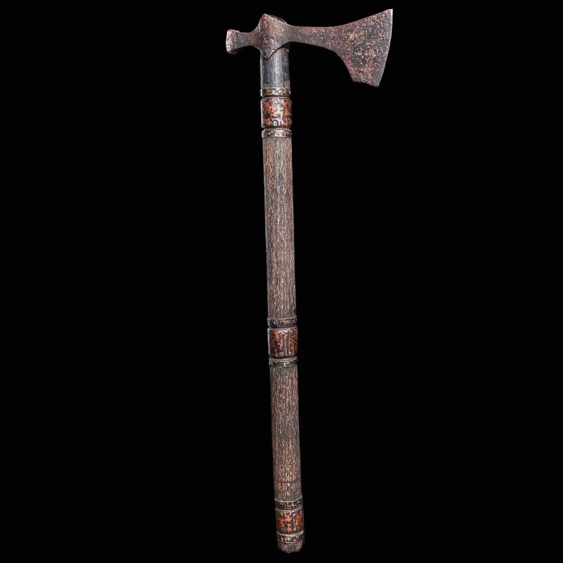 Viking Period Iron Axe: Eastern Steppes, Southern Europe, ca. 9th - 11th century CE. Hand-forged iron axe having a long tapered head and slightly curved single edge blade, squared at the bottom, pointed socket and opposing t