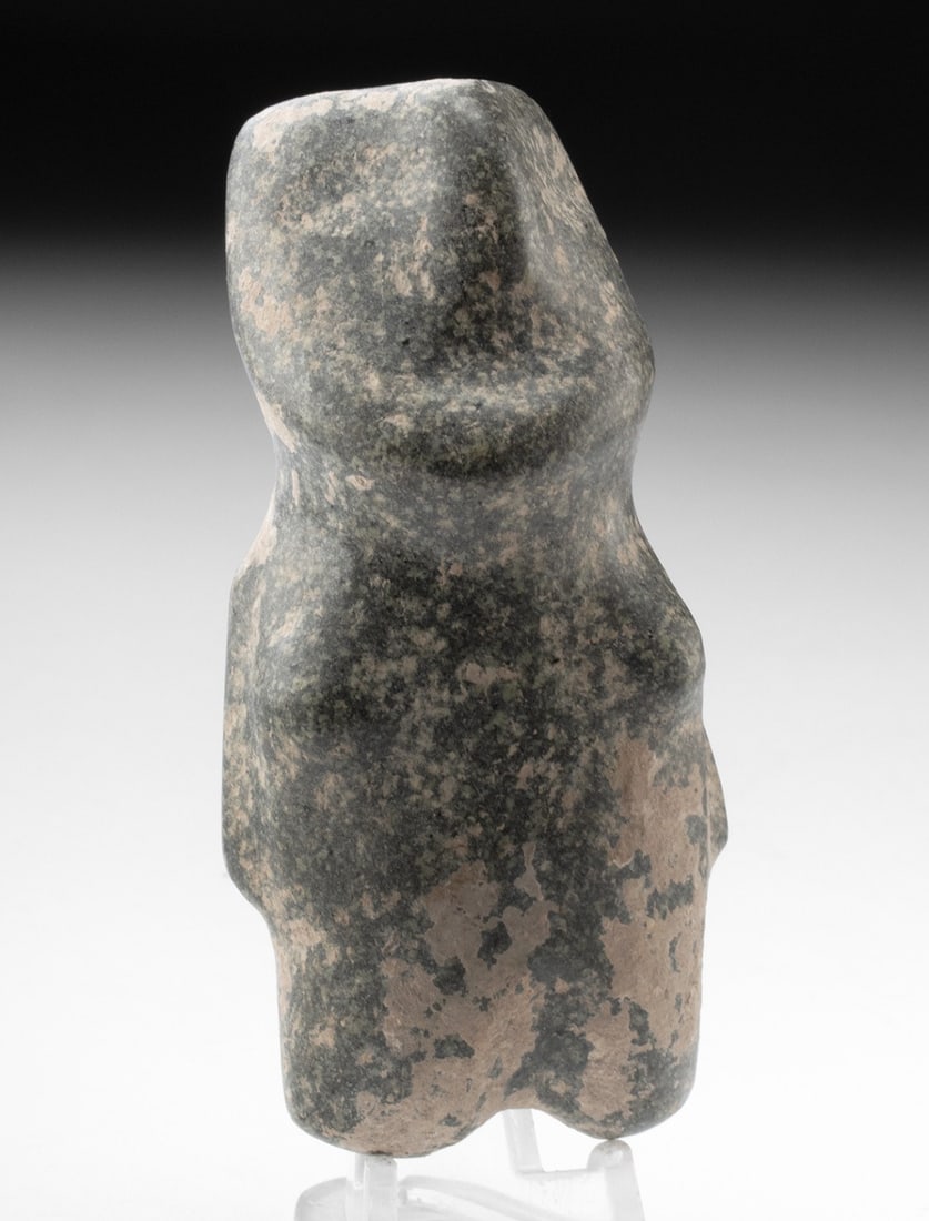 Guerrero Mezcala Greenstone Female Axe God: Pre-Columbian, Mexico, Guerrero, Mezcala culture, ca. 700 to 200 BCE. A compact stone figure representing a stylized female "axe god," carved in the characteristic abstract form associated with Mezcal