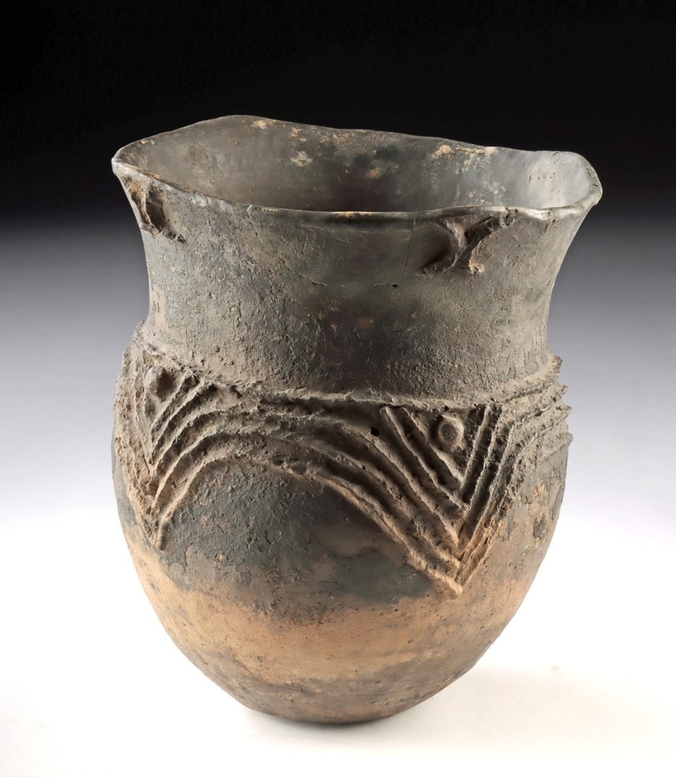 Caddo Pottery Jar - Harleton Applique: Native American, Mississippian, Late Caddo, Titus phase, ca. 1430 to 1680 CE. A robust Late Caddo pottery jar distinguished by its Harleton Applique decoration, with bold, raised zigzag bands and nodu