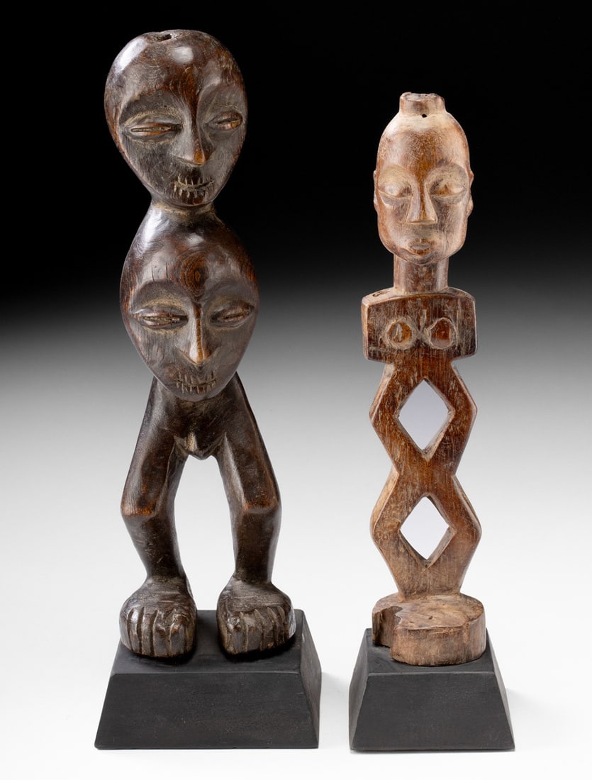 African Lega Bwami & Lengola Wood Abstract Figures: Central Africa, Democratic Republic of the Congo, Bantu cultures, Lega and Lengola, ca. 19th to early 20th century CE. A pair of carved wooden abstract figures. The larger example, with two stacked he