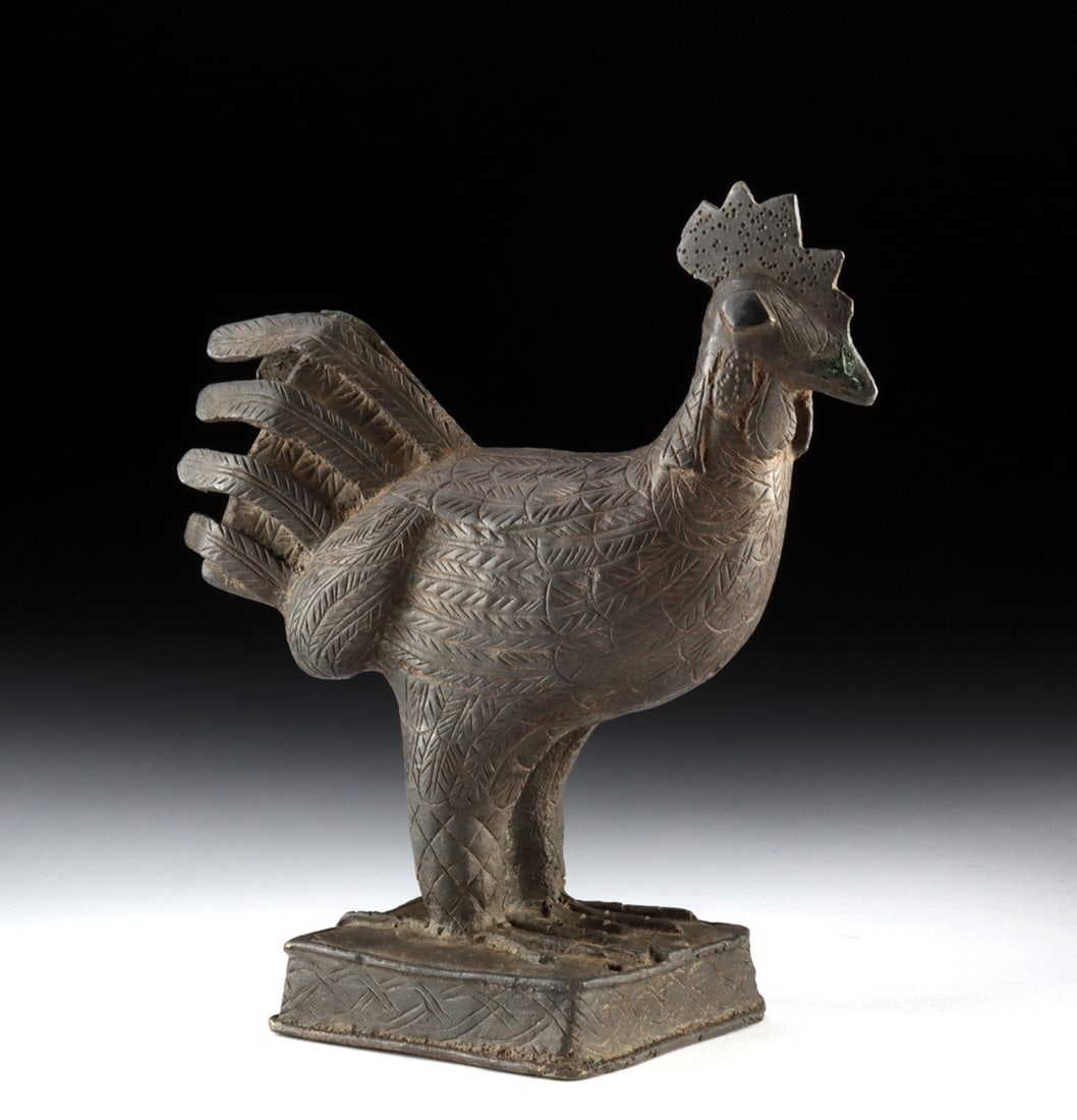 Benin Bronze Rooster (Okpa) - Royal Ancestral Altar Figure: West Africa, Nigeria, Kingdom of Benin, Edo people, ca. late 19th to early 20th century CE. A brass rooster cast by the lost-wax method, the body and fanned tail incised with overlapping feather chevr
