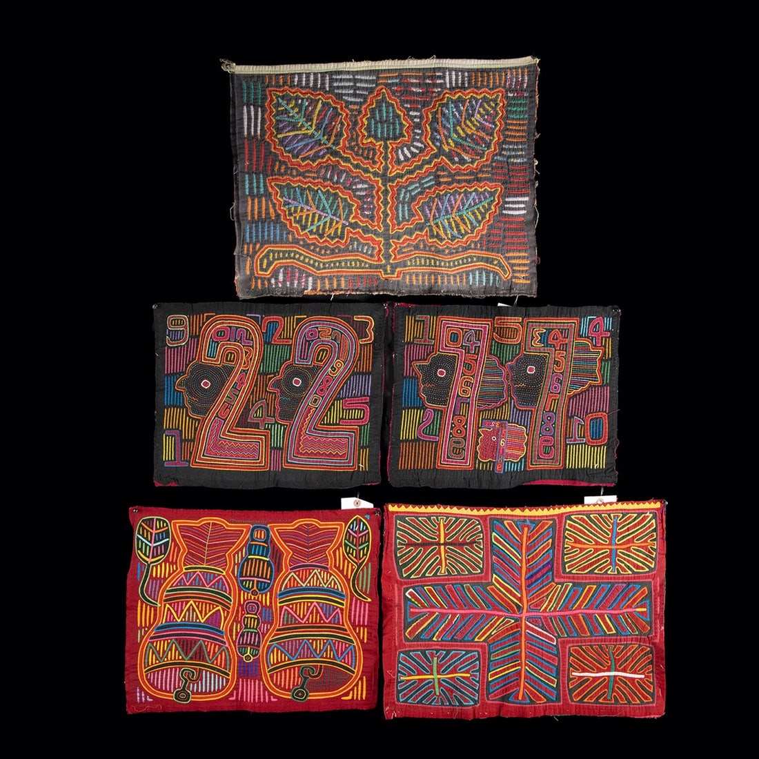 5 Panamanian Mola Applique Textile Panels: Central America, Panama, ca. 1950 - 1999 CE. Central America, Panama, Guna (Kuna) people, ca. mid to late 20th century. A group of five mola panels, the traditional reverse applique textile art of the